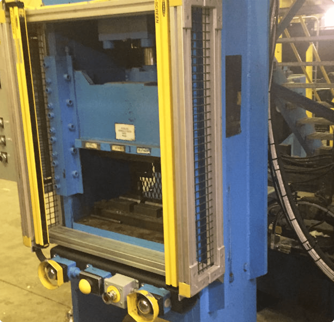 Industrial metal press machine in factory